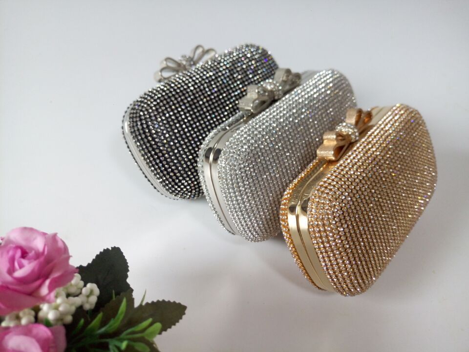 Rhinestone Chain Oval Evening Clutch Bag by CJ | 0 from Luxe Lane | SKU: CJNS145997601AZ | Barcode:  | Options: Silver | Rhinestone Chain Oval Evening Clutch Bag