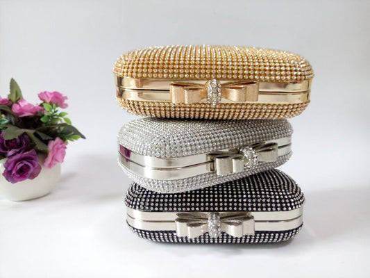 Rhinestone Chain Oval Evening Clutch Bag by CJ | 0 from Luxe Lane | SKU: CJNS145997601AZ | Barcode:  | Options: Silver | Rhinestone Chain Oval Evening Clutch Bag