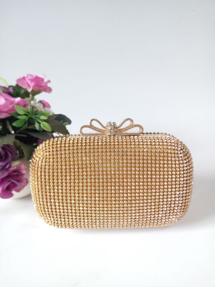Rhinestone Chain Oval Evening Clutch Bag by CJ | 0 from Luxe Lane | SKU: CJNS145997602BY | Barcode:  | Options: Gold | Rhinestone Chain Oval Evening Clutch Bag