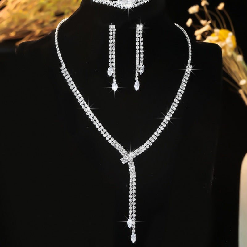 Rhinestone Necklace, Earrings, Bracelet & Ring Set by CJ | jewelry from Luxe Lane | SKU: CJLX224429501AZ | Barcode:  | Options: | Rhinestone Necklace, Earrings, Bracelet & Ring Set