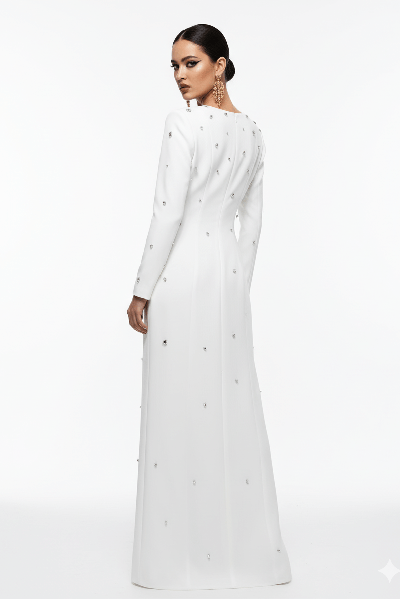 Rosabelle High - Neck Rhinestone Gown by Luxe Lane | from Luxe Lane | SKU:  | Barcode:  | Options: black S | back pose of Luxe Lane white high - neck rhinestone gown with silver crystal detailing and long sleeves