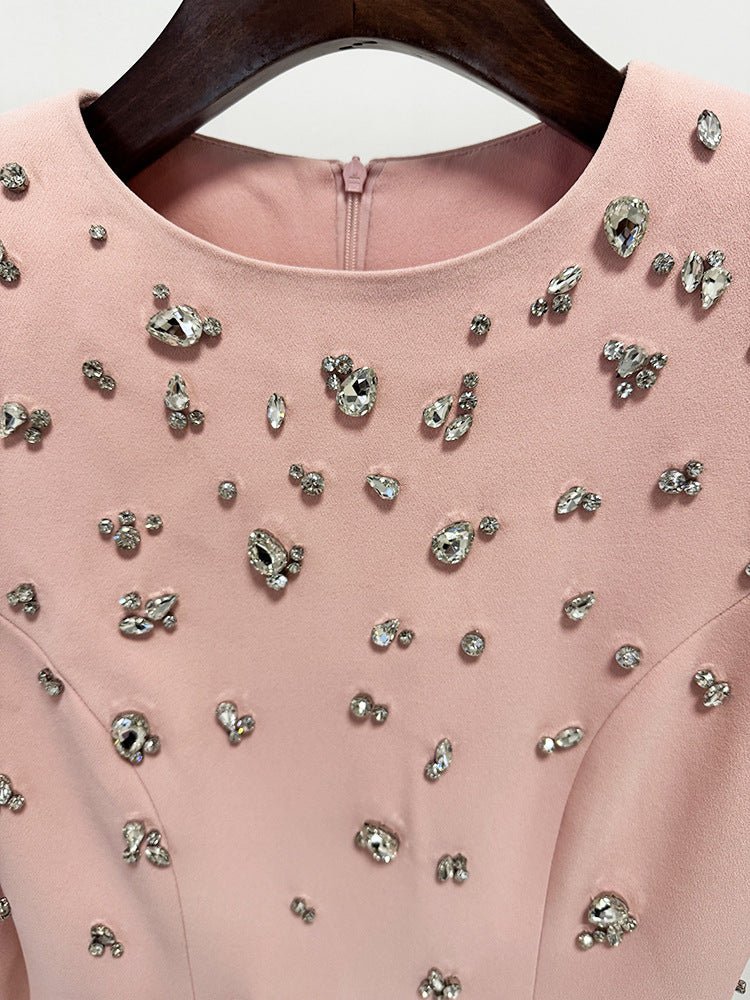 Rosabelle High - Neck Rhinestone Gown by Luxe Lane | from Luxe Lane | SKU:  | Barcode:  | Options: white S | close - up of Luxe Lane blush pink neckline with sparkling crystal embellishment and structured finish