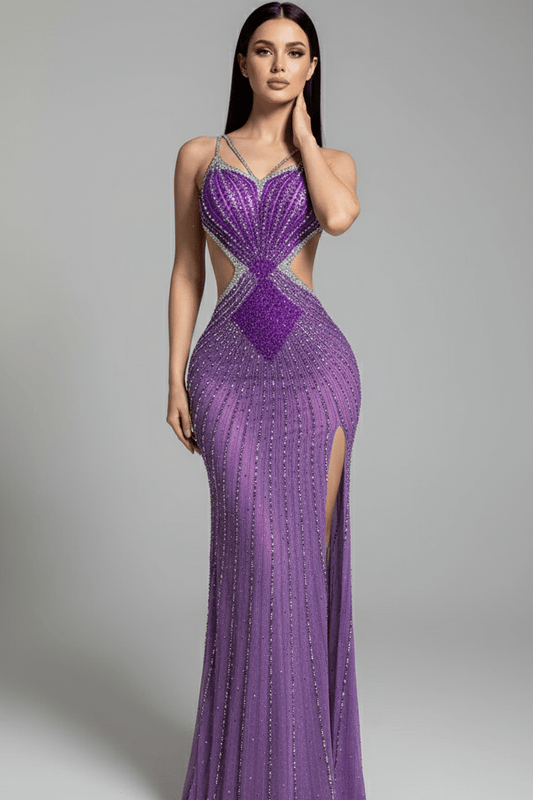 crystal mermaid gownMermaid Gown by Shine | from Luxe Lane | SKU:  | Barcode:  | Options: Purple S | Woman wearing a purple evening gown with a high slit on a gray background