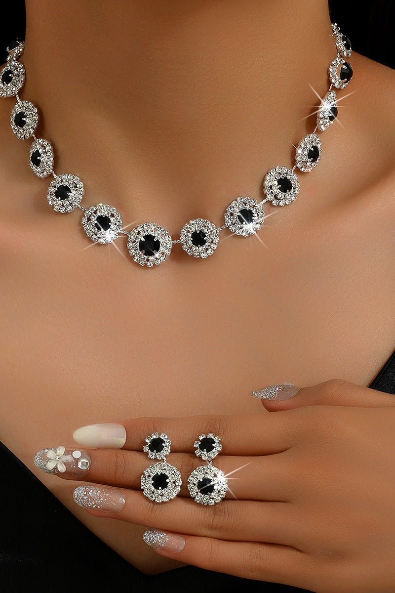 Round Rhinestone Quartz Necklace & Earrings Set by CJ | 0 from Luxe Lane | SKU: CJLX246901901AZ | Barcode:  | Options: White | Jewelry set with necklace, earrings, and ring on a mannequin.