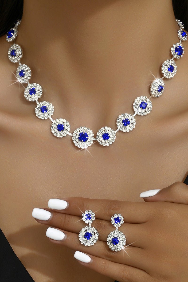 Round Rhinestone Quartz Necklace & Earrings Set by CJ | 0 from Luxe Lane | SKU: CJLX246901905EV | Barcode:  | Options: Blue | Necklace and earrings with blue and clear gemstones on a model