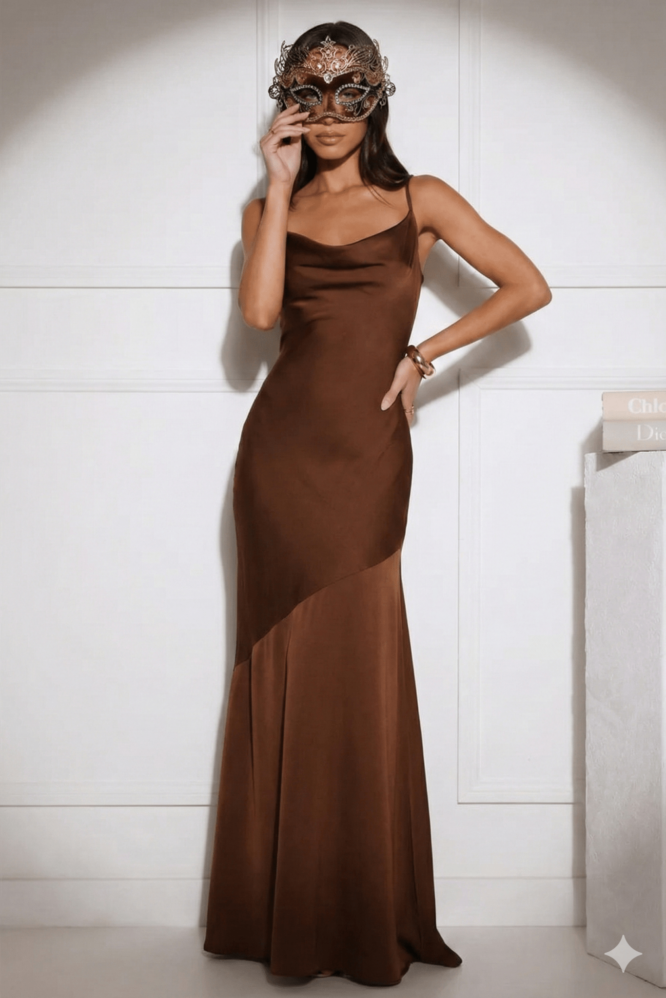 Satin Spaghetti Strap Mermaid Maxi Evening Dress by Luxe Lane | mermaid gown from Luxe Lane | SKU: -1 | Barcode:  | Options: Brown XS(4) | Woman wearing a brown evening gown with a gold mask against a white background