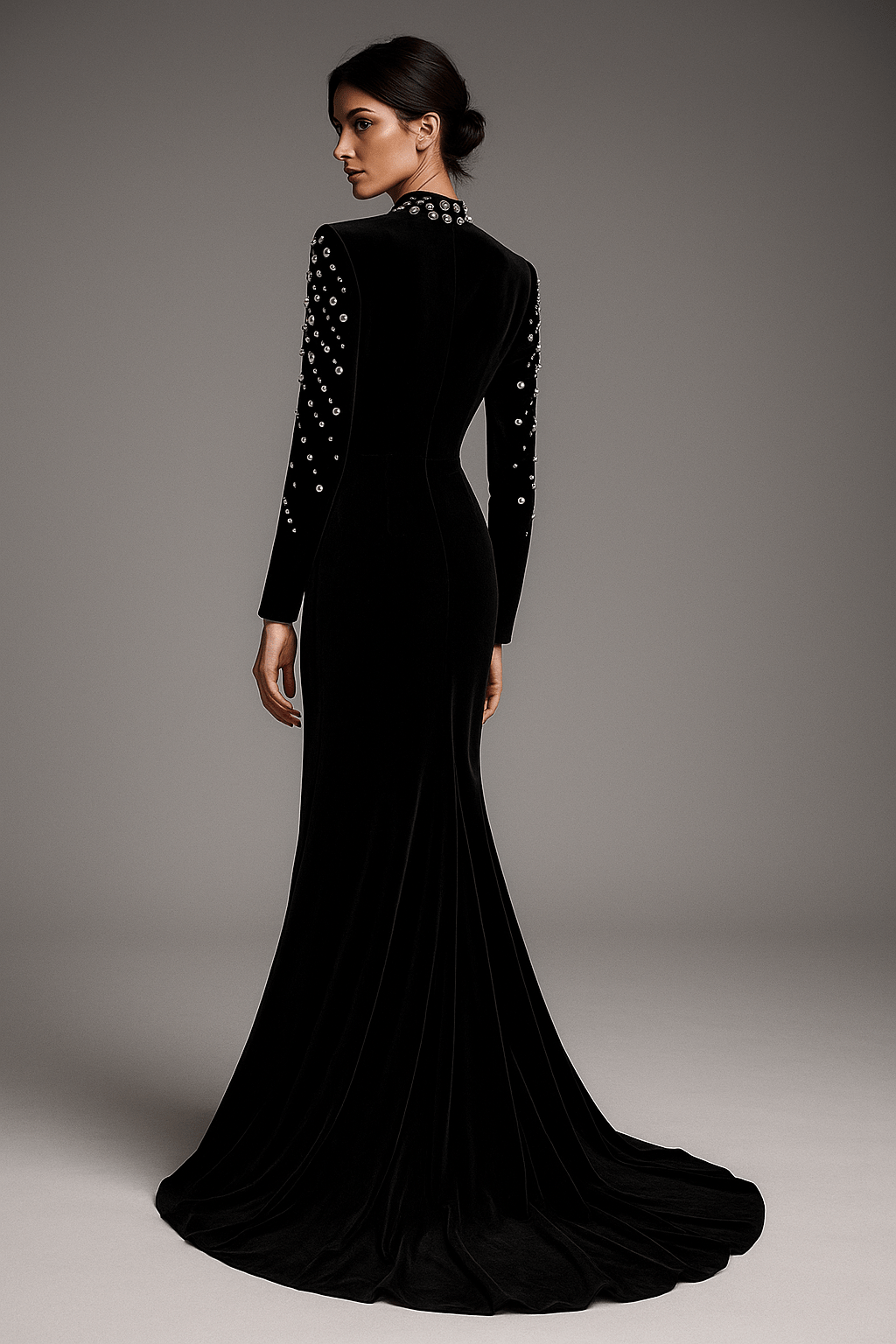 Seliora Velvet Rhinestone Mermaid Gown by luxe lane| mermaid gown from Luxe Lane | SKU: W11398-1 | Barcode:  | Options: Black S | Black evening gown with intricate detailing on a gray background