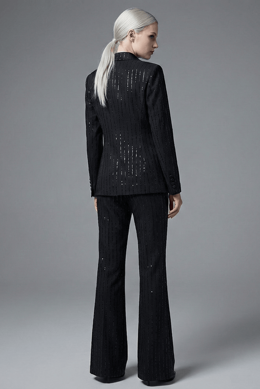 Sequined Blazer & Flared Pants Formal Suit Set by Shine | Suit Set from Luxe Lane | SKU: -1 | Barcode:  | Options: Black S(2) | Woman wearing a black suit with sequin details on a gray background