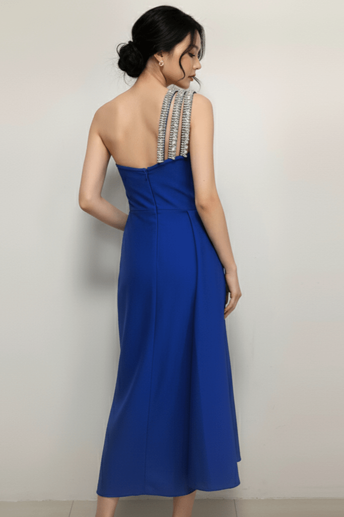 Seraphine One - Shoulder Rhinestone Maxi Gown by Shine | heath gown from Luxe Lane | SKU: -1 | Barcode:  | Options: Blue S | Woman wearing a blue evening gown with a beaded back against a plain background