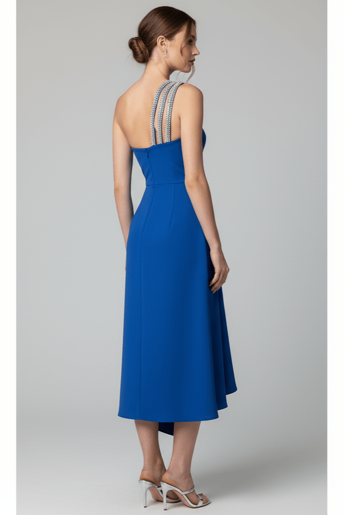 Seraphine One - Shoulder Rhinestone Maxi Gown by Shine | heath gown from Luxe Lane | SKU: -1 | Barcode:  | Options: Blue S | Woman wearing a blue dress with a gray background