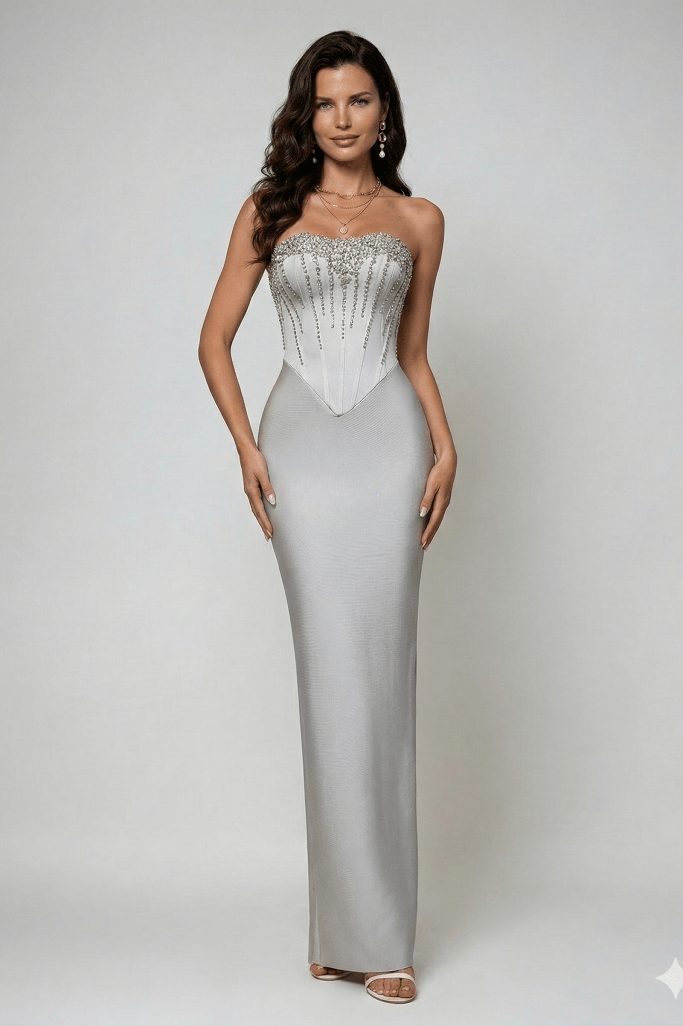 Strapless Rhinestone Corset Maxi Gown by Shine | Party dresses from Luxe Lane | SKU: -1 | Barcode:  | Options: Light gray XS(4) | Woman wearing a silver strapless gown with intricate detailing on a white background