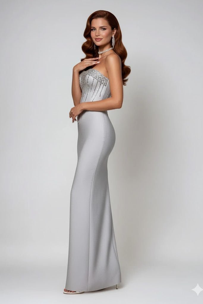 Strapless Rhinestone Corset Maxi Gown by Shine | Party dresses from Luxe Lane | SKU: -1 | Barcode:  | Options: Light gray XS(4) | Woman wearing a silver evening gown with a white background