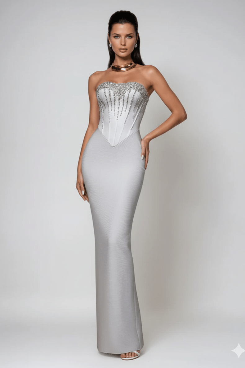 Strapless Rhinestone Corset Maxi Gown by Shine | Party dresses from Luxe Lane | SKU: -1 | Barcode:  | Options: Light gray XS(4) | Woman wearing a strapless silver evening gown on a white background