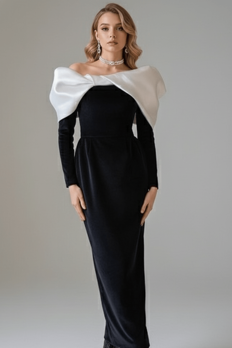 V - Neck Bow Detail Bodycon Maxi Dress by Luxe Lane | Dresses from Luxe Lane | SKU: -1 | Barcode:  | Options: Black XS | Woman wearing a black and white dress with a large bow on a gray background