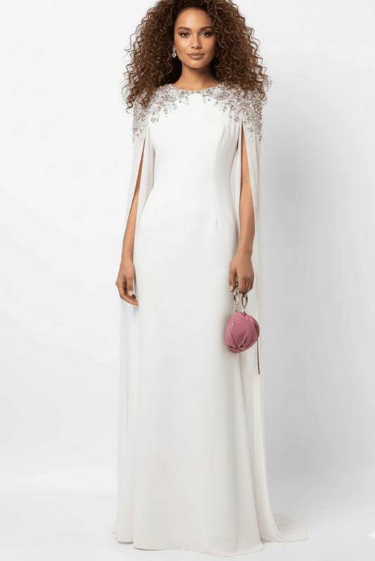 Valencia Beaded Cape Sleeve Evening Gown by none | a - line gown from Luxe Lane | SKU:  | Barcode:  | Options: White S(6) | Woman wearing a white dress with lace details on a white background