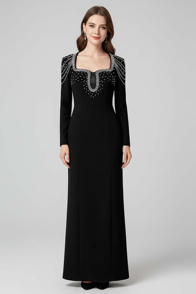 Valentina Embellished Evening Gown by Luxe Lane | Formal Gown from Luxe Lane | SKU:  | Barcode:  | Options: Red S | Woman wearing a black evening gown with silver embellishments on a gray background