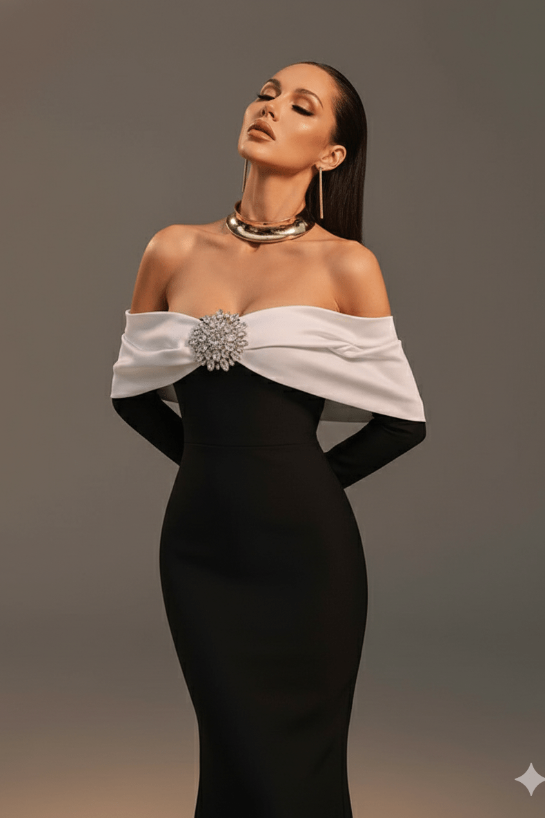 Vienna Off - Shoulder Black & White Bodycon Evening Gown by Guangdong | Party dresses from Luxe Lane | SKU: -1 | Barcode:  | Options: Black S(6) | Woman wearing a black and white off - shoulder dress with a brooch on a gray background
