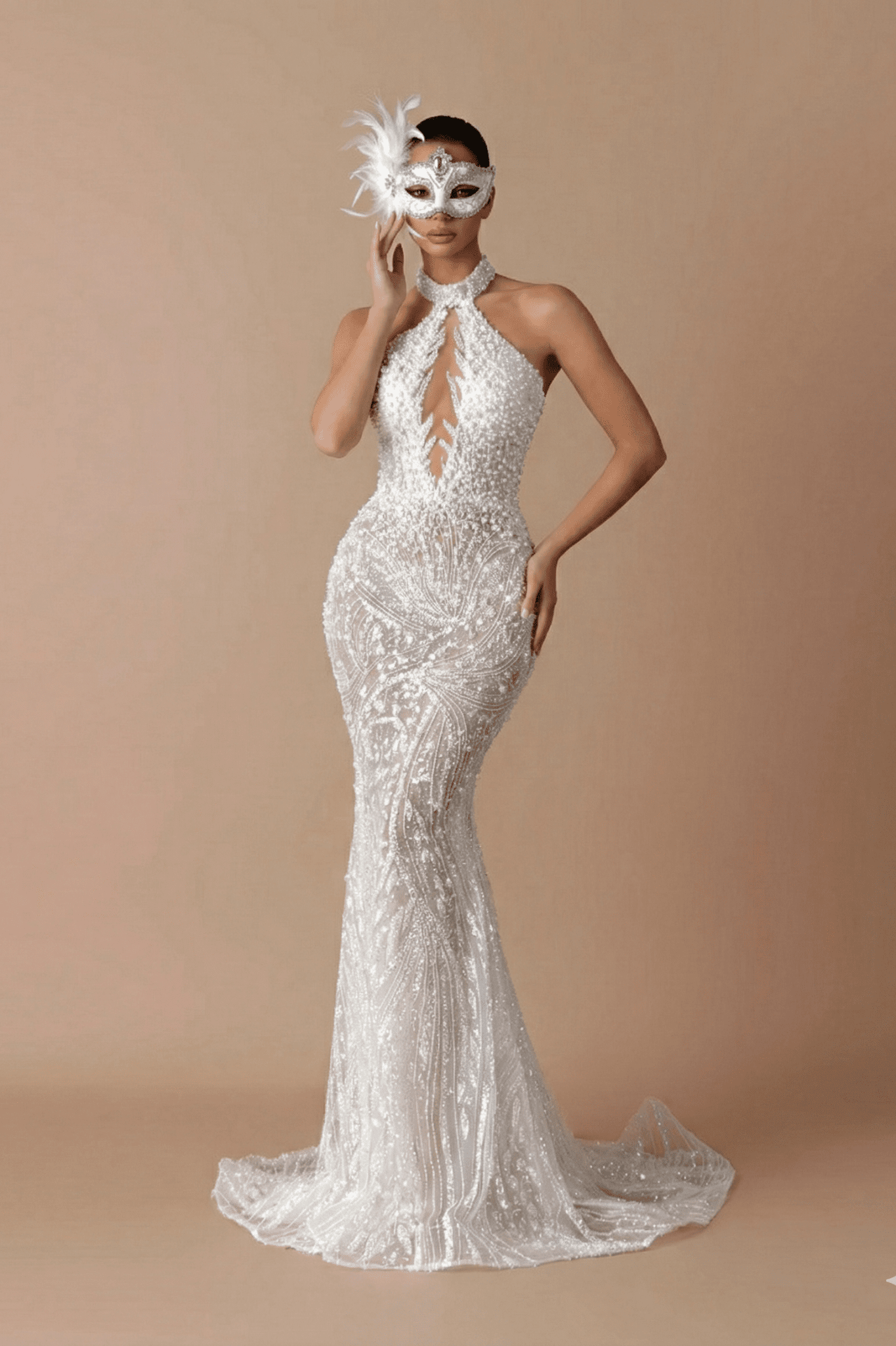 White Sequin Halter Backless Mermaid Evening Gown by Luxe Lane | mermaid gown from Luxe Lane | SKU: W11508-1 | Barcode:  | Options: White XS(0) | Woman wearing a sparkling evening gown and mask against a beige background