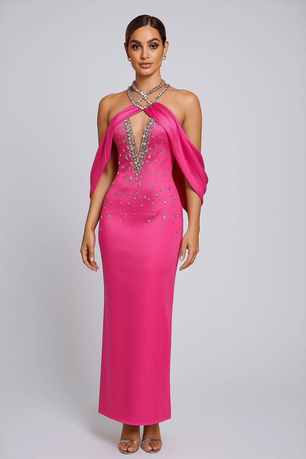 Zephyra Halter Rhinestone Mermaid Gown by Luxe Lane | from Luxe Lane | SKU:  | Barcode:  | Options: Black S | Woman wearing a pink evening gown with silver embellishments on a gray background
